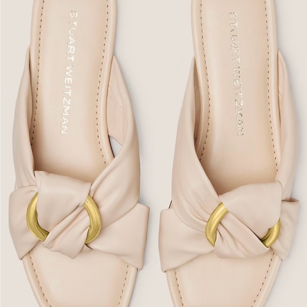 Cece slides Stuart Weitzman Cream and Gold Mules with Knot Detail